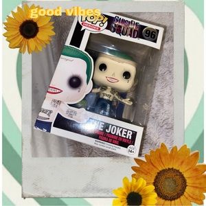 Joker Funko Pop and Dorbz Figure